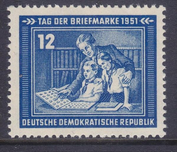 Europe | Parent and Children With Album East Germany Postage Stamp Issued 1951 Violet ultramarine Europe Europe