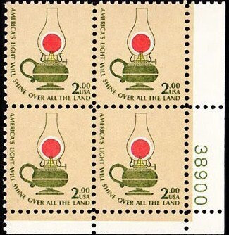 United States | Kerosene Lamp Plate Block of Four Two-Dollar United States Postage Stamps Issued 1978 Tan, dark green, orange and yellow Stamp Tan, dark green, orange & yellow