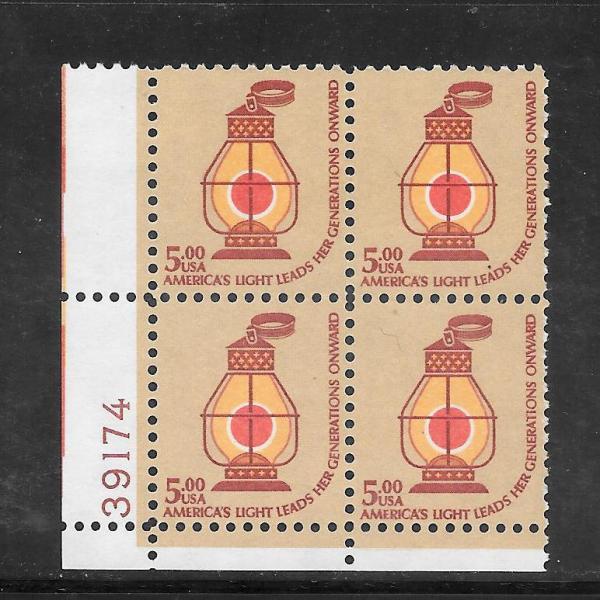 United States | Railroad Conductor’s Lantern Plate Block of Four Five-Dollar United States Postage Stamps Issued 1979 Tan, red brown, orange and yellow Stamp Tan, red brown, orange & yellow